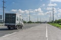 Bambam, Tarlac, Philippines - A truck passes through the highway passing through flat plains. At SCTEX in Tarlac