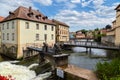 Bamberg, Germany. Dams, bridges, old houses on artificial islands and banks of the river Regnitz
