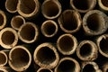 Bamboo abstract background. Pile of bamboo pole. Stack of round timber logs. Large batch of wooden logs for industrial scale or Royalty Free Stock Photo