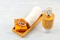 Bamboo acessories for bath - bowl, soap dispenser, brushes, tooth brush, towel and organic dry shampoo for personal hygiene Royalty Free Stock Photo