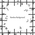 Bamboo background in the form of a window made of bamboo sticks. Black pattern of trellis and bamboo branches with leaves