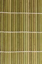 Bamboo background texture. Green mat for making sushi rolls Royalty Free Stock Photo