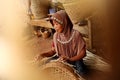 Bamboo basket craftswoman while doing his work Royalty Free Stock Photo