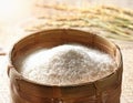 A bamboo basket filled with freshly milled rice Royalty Free Stock Photo