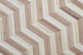Bamboo blocks in two bright colors arranged in a chevron pattern. Wooden background texture Royalty Free Stock Photo