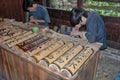 Bamboo carvers are busy making souvenirs
