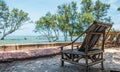 Bamboo chair facing sea Royalty Free Stock Photo