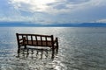 A Bamboo Chair is Soaked in the Ocean