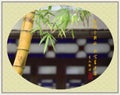 Bamboo with classical Chinese poetry, traditional Chinese painting style.