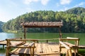 Bamboo cottage floating on rim reservoir Royalty Free Stock Photo