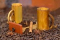 Bamboo cups and coffee beans, cofee grinded in wood box, anis and cinnamon