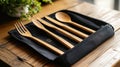 Bamboo cutlery set in a reusable pouch Royalty Free Stock Photo