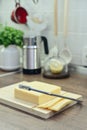 Bamboo cutting board with a built-in cheese cutting device Royalty Free Stock Photo