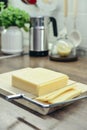 Bamboo cutting board with a built-in cheese cutting device Royalty Free Stock Photo