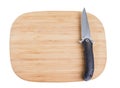 Bamboo cutting board with a knife. Royalty Free Stock Photo