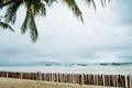 Bamboo fence on White beach view on Boracay. Oct 2016 Royalty Free Stock Photo