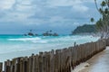 Bamboo fence on White beach view on Boracay, Philippines Royalty Free Stock Photo