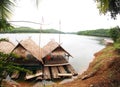 Bamboo floating raft in high mountain lake panorama view