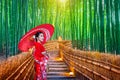 Bamboo Forest. Asian woman wearing japanese traditional kimono at Bamboo Forest in Kyoto, Japan Royalty Free Stock Photo