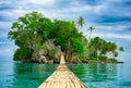 Bamboo hanging bridge over sea to tropical island Royalty Free Stock Photo