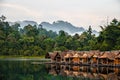 Bamboo huts floating in a Thai village