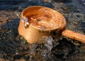 Bamboo ladle and splash Royalty Free Stock Photo