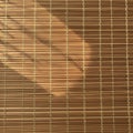 The bamboo is light brown with a natural grain, creating a warm, rustic Royalty Free Stock Photo