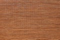 Bamboo mat closeup. Thin strips of wood sewn into fabric. Decorative textured backdrop. Horizontal template of background for