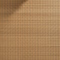 A bamboo mat with a grid-like pattern of thin, rectangular slats arranged horizontally and Royalty Free Stock Photo