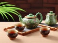 Bamboo mat with a Japanese teapot and cups.