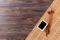 Bamboo mat and soy sauce with sushi chopsticks on wooden table. Top view with copy space background for sushi. Flat lay Royalty Free Stock Photo