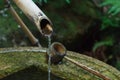 Bamboo Pipe with water dipper Royalty Free Stock Photo