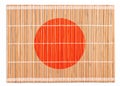 Bamboo placemat colored as Japanese flag Royalty Free Stock Photo