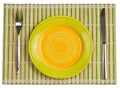 Bamboo placemat with plate fork, knife top view