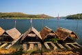 Bamboo raft floating on water in dam Royalty Free Stock Photo