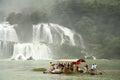 Bamboo Raft with tourists at Ban Gioc Waterfall, Vietnam Royalty Free Stock Photo