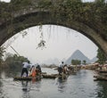 Bamboo rafting along Yulong River during the winter season with beauty of the landscape is a popular activity in Guilin. Royalty Free Stock Photo