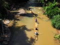 Bamboo rafting in green tropical scenery as a tour for tourist in Mae Wang District Chiang Mai Thailand Royalty Free Stock Photo