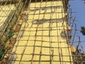 Bamboo Scaffolding on twenty five year old four storey building gating structural Repair work