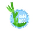 Bamboo stalks with leaves in a round badge design. Eco-friendly natural bamboo logo. Green sustainable resource concept