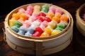 bamboo steamer filled with colorful dim sum