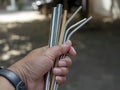 Bamboo and steel straws, an alternative to reducing plastic straws. The concept of reducing non-degradable plastic waste