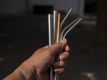 Bamboo and steel straws, an alternative to reducing plastic straws. The concept of reducing non-degradable plastic waste