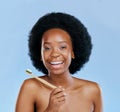 Bamboo toothbrush, face and black woman excited in studio isolated on a blue background. Portrait, toothpaste and model Royalty Free Stock Photo