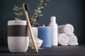 Bamboo toothbrush, towels and other bathroom accessories Royalty Free Stock Photo