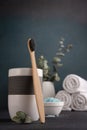 Bamboo toothbrush, towels and other bathroom accessories Royalty Free Stock Photo