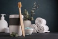 Bamboo toothbrush, towels and other bathroom accessories Royalty Free Stock Photo