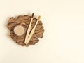 Bamboo toothbrushes and natural oatmeal tooth powder on a beige background. Ecostyle. Zero waste