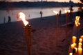 Bamboo torches. night lit torch on the beach Royalty Free Stock Photo