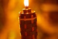 bamboo torches at night with yellow flames and highlights Royalty Free Stock Photo